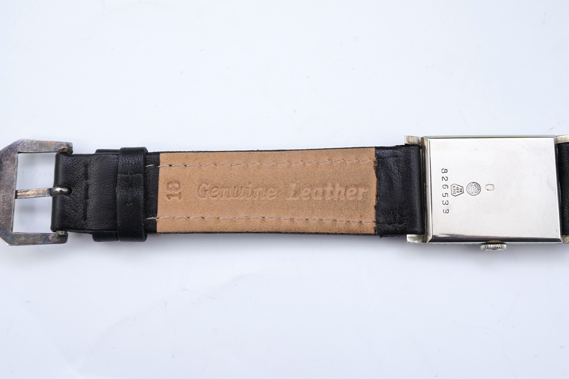 A lady's 18k white gold International Watch Company manual wind wrist watch, on a later associated leather strap